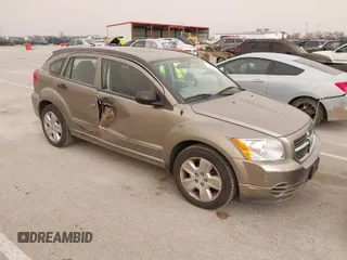2007 Dodge Caliber SXT with VIN 1B3HB48B57D272932, listed as a IAAI auction lot 41818332 with 122,904 mi miles and . Bid and sale history available at DreamBid. Image 1.