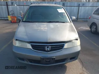 2002 Honda Odyssey EX z VIN 5FNRL186X2B014652, wystawiony jako IAAI lot #41950225 z przebiegiem 286 959 mil mil oraz . Historia ofert i sprzedaży dostępna na DreamBid. Obrazek 6.