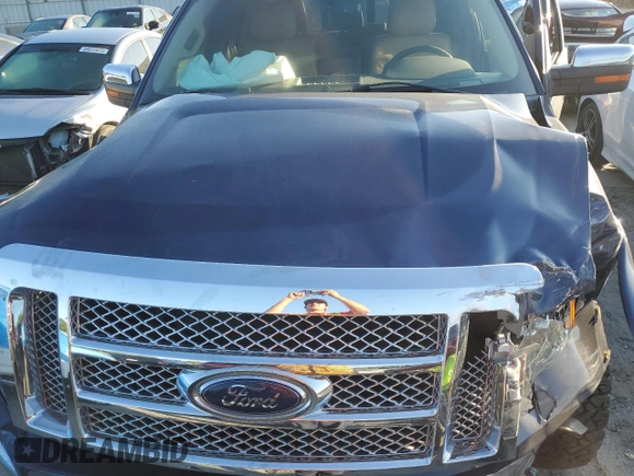 2012 Ford F-150 XL z VIN 1FTFW1ET7CFC68921, wystawiony jako Copart lot #57980135 z przebiegiem 121 407 mil mil oraz Szkoda całkowita • Salvage title. Historia ofert i sprzedaży dostępna na DreamBid. Obrazek 11.