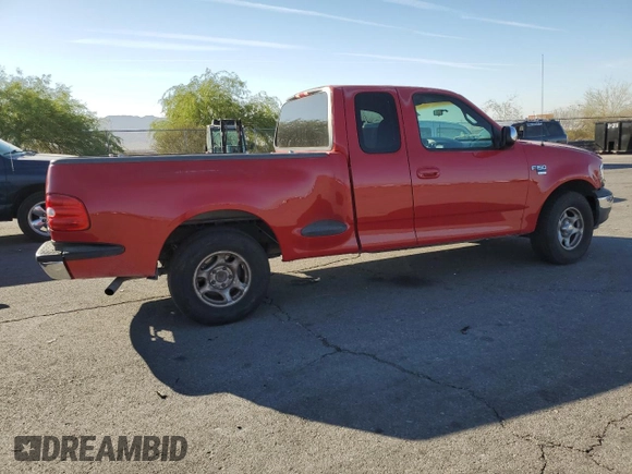 1999 Ford F-150 with VIN 1FTRX07W2XKC24186, listed as a Copart auction lot 74553294 with Not provided miles and Salvage title. Bid and sale history available at DreamBid. Image 3.