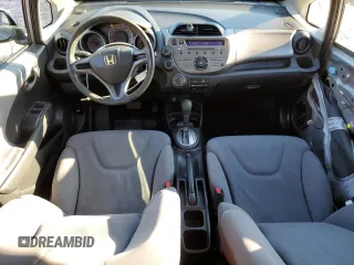 2009 Honda Fit with VIN JHMGE88219S050197, listed as a Copart auction lot 45876345 with 208,046 mi miles and Salvage Title. Bid and sale history available at DreamBid. Image 8.