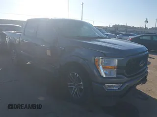 2021 Ford F-150 XL with VIN 1FTEW1C56MFA89903, listed as a IAAI auction lot 41657308 with 105,626 mi miles. Bid and sale history available at carsss.com. Image 1.