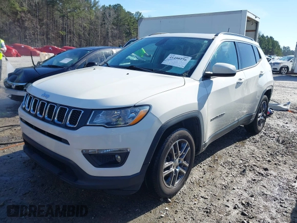 2019 Jeep Compass Altitude z VIN 3C4NJCBB0KT743170, wystawiony jako IAAI lot #41490256 z przebiegiem 93 319 mil mil oraz . Historia ofert i sprzedaży dostępna na DreamBid. Obrazek 2.