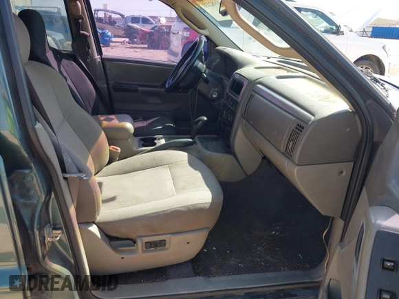 2002 Jeep Grand Cherokee Laredo с VIN 1J4GX48S42C287863, выставлен на аукционе IAAI как лот 41982433 с пробегом Не указан миль и . История ставок и продаж доступна на DreamBid. Изображение 5.