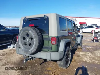 2008 Jeep Wrangler Unlimited X with VIN 1J8GA39118L594626, listed as a IAAI auction lot 41618878 with 166,071 mi miles and . Bid and sale history available at DreamBid. Image 4.