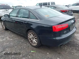 2013 Audi A6 Premium Plus with VIN WAUGFAFC4DN131779, listed as a IAAI auction lot 42373464 with 133,505 mi miles and . Bid and sale history available at DreamBid. Image 3.