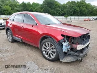 2018 Mazda CX-9 Grand Touring with VIN JM3TCBDYXJ0200019, listed as a Copart auction lot 57895335 with 140,607 mi miles and Salvage title. Bid and sale history available at DreamBid. Image 4.