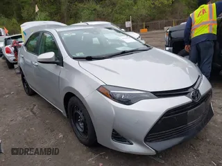 2018 Toyota Corolla L z VIN 2T1BURHE5JC007745, wystawiony jako IAAI lot #42145183 z przebiegiem 152 661 mil mil oraz . Historia ofert i sprzedaży dostępna na DreamBid. Obrazek 1.