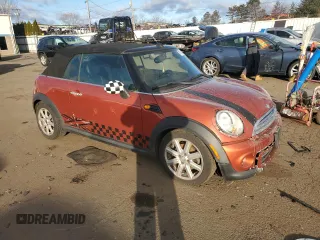 2012 MINI Convertible z VIN WMWZN3C57CT265368, wystawiony jako Copart lot #87100414 z przebiegiem 124 102 mil mil oraz Szkoda całkowita • Salvage title. Historia ofert i sprzedaży dostępna na DreamBid. Obrazek 4.
