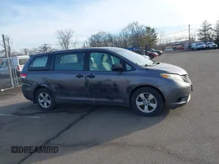2012 Toyota Sienna with VIN 5TDZK3DCXCS258843, listed as a IAAI auction lot 41700446 with 207,384 mi miles. Bid and sale history available at carsss.com. Image 13.