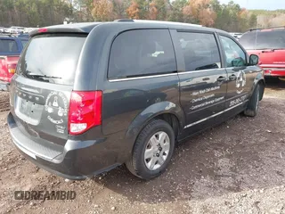2011 Dodge Grand Caravan Crew with VIN 2D4RN5DG7BR763707, listed as a IAAI auction lot 41087199 with 230,637 mi miles and . Bid and sale history available at DreamBid. Image 4.
