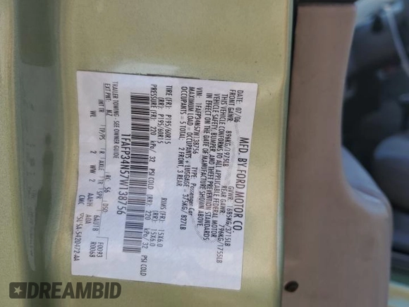 2007 Ford Focus S with VIN 1FAFP34N57W138756, listed as a Copart auction lot 54402375 with 260,127 mi miles and Salvage title. Bid and sale history available at DreamBid. Image 12.