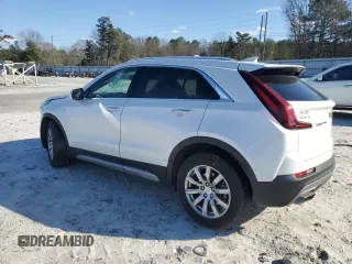 2022 Cadillac XT4 FWD Premium Luxury with VIN 1GYFZCR45NF100049, listed as a Copart auction lot 87232634 with 62,391 mi miles and Salvage title. Bid and sale history available at DreamBid. Image 2.