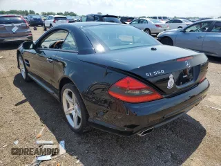 2009 Mercedes-Benz SL 550 with VIN WDBSK71F79F146967, listed as a Copart auction lot 62679494 with 57,412 mi miles and Salvage title. Bid and sale history available at DreamBid. Image 2.