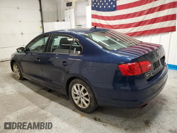 2012 Volkswagen Jetta SE z VIN 3VWDP7AJ5CM410644, wystawiony jako Copart lot #56464105 z przebiegiem 97 486 mil mil oraz Szkoda całkowita • Salvage title. Historia ofert i sprzedaży dostępna na DreamBid. Obrazek 2.