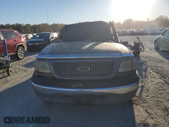 2002 Ford F-150 XL with VIN 1FTRF17W42NA89079, listed as a Copart auction lot 76519634 with Not Provided miles and Salvage Title. Bid and sale history available at carsss.com. Image 5.