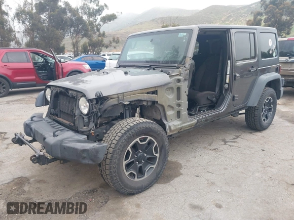 2014 Jeep Wrangler Unlimited Sport with VIN 1C4BJWDG7EL244749, listed as a IAAI auction lot 41871127 with 128,420 mi miles and . Bid and sale history available at DreamBid. Image 2.