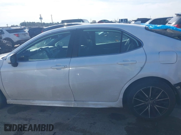 2023 Toyota Camry SE z VIN 4T1G11AK6PU770039, wystawiony jako IAAI lot #41375553 z przebiegiem 46 352 mil mil oraz . Historia ofert i sprzedaży dostępna na DreamBid. Obrazek 15.