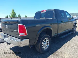 2018 Ram 2500 Laramie with VIN 3C6UR5NL9JG276737, listed as a IAAI auction lot 42378589 with 75,897 mi miles and . Bid and sale history available at DreamBid. Image 4.