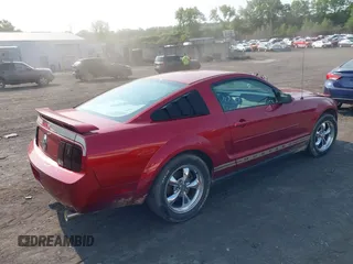 2005 Ford Mustang Deluxe with VIN 1ZVFT80N655177798, listed as a IAAI auction lot 42411831 with 112,236 mi miles and . Bid and sale history available at DreamBid. Image 4.