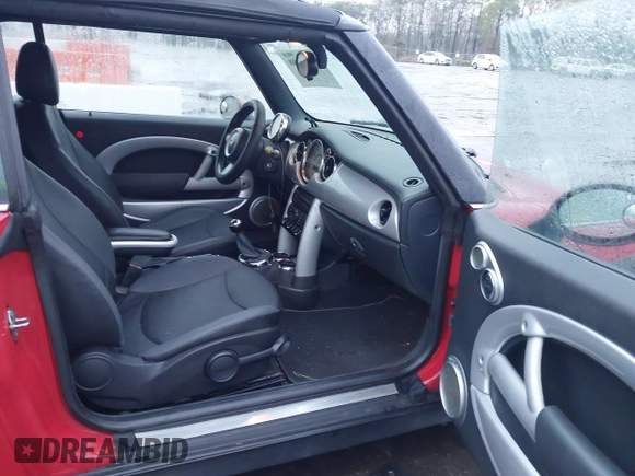 2006 MINI Convertible with VIN WMWRF33526TF64836, listed as a IAAI auction lot 41766880 with 207,094 mi miles and . Bid and sale history available at DreamBid. Image 5.