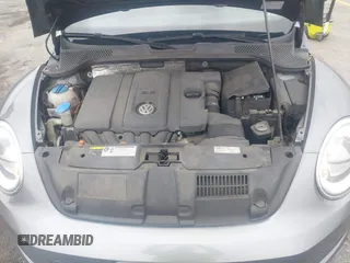 2013 Volkswagen Beetle 2.5L with VIN 3VWJP7AT6DM667477, listed as a IAAI auction lot 42215545 with 87,392 mi miles and . Bid and sale history available at DreamBid. Image 10.