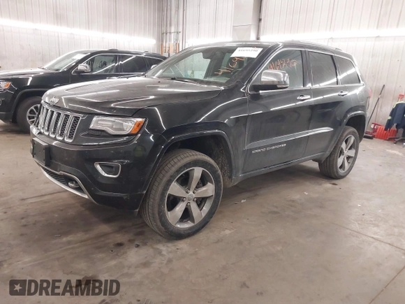 2014 Jeep Grand Cherokee Overland with VIN 1C4RJFCG8EC177899, listed as a IAAI auction lot 41695290 with 200,867 mi miles and . Bid and sale history available at DreamBid. Image 20.