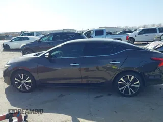 2016 Nissan Maxima Platinum with VIN 1N4AA6AP2GC385723, listed as a IAAI auction lot 41753328 with 162,845 mi miles and . Bid and sale history available at DreamBid. Image 14.
