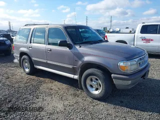 1997 Ford Explorer XLT z VIN 1FMDU35P4VUA75731, wystawiony jako IAAI lot #41718234 z przebiegiem 194 358 mil mil oraz . Historia ofert i sprzedaży dostępna na DreamBid. Obrazek 1.