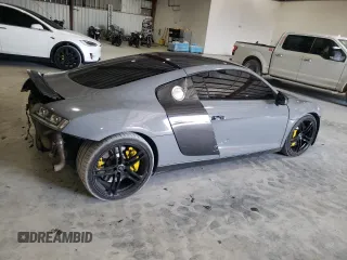 2009 Audi R8 4.2L z VIN WUAAU34279N002238, wystawiony jako Copart lot #74154804 z przebiegiem 71 425 mil mil oraz Szkoda całkowita • Salvage title. Historia ofert i sprzedaży dostępna na DreamBid. Obrazek 3.