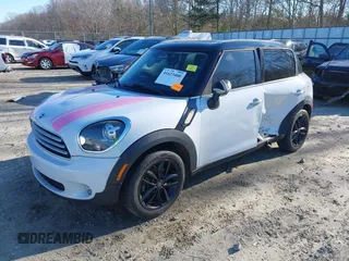 2012 MINI Countryman with VIN WMWZB3C50CWM30524, listed as a IAAI auction lot 41623400 with 194,858 mi miles and . Bid and sale history available at DreamBid. Image 2.