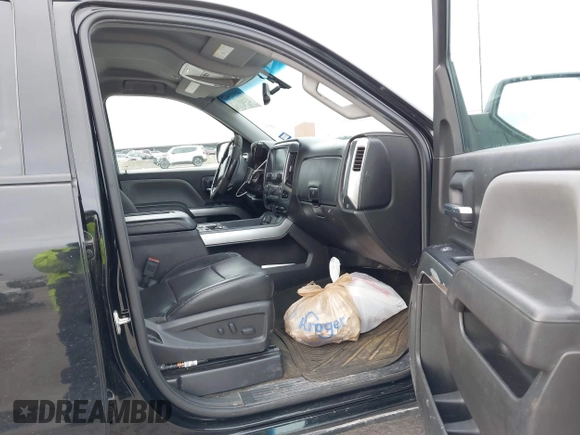 2017 Chevrolet Silverado 1500 LT with VIN 1GCUKREC2HF208232, listed as a IAAI auction lot 40933445 with 105,928 mi miles and . Bid and sale history available at DreamBid. Image 5.