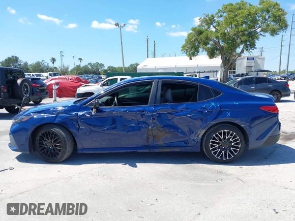 2025 Toyota Camry LE with VIN 4T1DAACK3SU104152, listed as a IAAI auction lot 42039337 with 1,423 mi miles and . Bid and sale history available at DreamBid. Image 14.