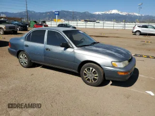 1994 Toyota Corolla with VIN 1NXAE04B7RZ129212, listed as a Copart auction lot 56760095 with 156,822 mi miles and Non repairable. Bid and sale history available at DreamBid. Image 4.