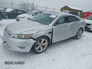 2011 Ford Taurus SHO with VIN 1FAHP2KT8BG155008, listed as a IAAI auction lot 41596940 with 239,898 mi miles and . Bid and sale history available at DreamBid. Image 2.