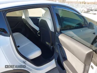 2023 Tesla Model Y Long Range with VIN 7SAYGDEE5PA094253, listed as a IAAI auction lot 41701966 with 29,458 mi miles and . Bid and sale history available at DreamBid. Image 8.