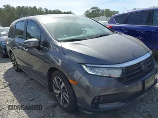 2024 Honda Odyssey Touring z VIN 5FNRL6H82RB031695, wystawiony jako IAAI lot #41825754 z przebiegiem 14 079 mil mil oraz . Historia ofert i sprzedaży dostępna na DreamBid. Obrazek 1.