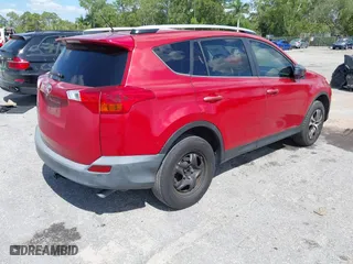 2014 Toyota RAV4 LE with VIN JTMZFREV4EJ005203, listed as a IAAI auction lot 42022295 with 130,193 mi miles. Bid and sale history available at carsss.com. Image 4.