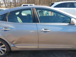 2016 Hyundai Azera Limited z VIN KMHFH4JGXGA568911, wystawiony jako IAAI lot #41428434 z przebiegiem 158 202 mil mil oraz . Historia ofert i sprzedaży dostępna na DreamBid. Obrazek 12.