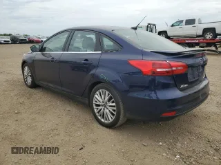 2017 Ford Focus Titanium with VIN 1FADP3J27HL298402, listed as a Copart auction lot 57340875 with 110,172 mi miles and Salvage title. Bid and sale history available at DreamBid. Image 2.