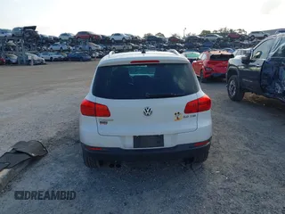 2013 Volkswagen Tiguan SE with VIN WVGAV7AX5DW545202, listed as a IAAI auction lot 42318584 with 91,556 mi miles and . Bid and sale history available at DreamBid. Image 16.