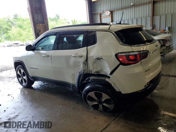2019 Jeep Compass Latitude with VIN 3C4NJDBB6KT598559, listed as a Copart auction lot 58313545 with 70,022 mi miles and Salvage title. Bid and sale history available at DreamBid. Image 2.