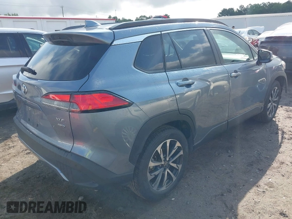 2022 Toyota Corolla Cross XLE with VIN 7MUEAABG1NV038625, listed as a IAAI auction lot 42434536 with 47,983 mi miles and . Bid and sale history available at DreamBid. Image 4.
