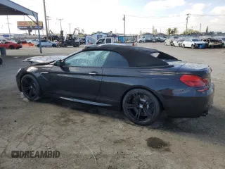 2016 BMW M6 z VIN WBS6G9C57GD932144, wystawiony jako Copart lot #72273744 z przebiegiem 71 614 mil mil oraz Szkoda całkowita • Salvage title. Historia ofert i sprzedaży dostępna na DreamBid. Obrazek 2.
