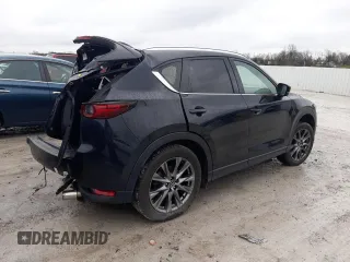 2021 Mazda CX-5 Signature with VIN JM3KFBEY8M0436075, listed as a Copart auction lot 85061194 with 66,471 mi miles and Salvage Title. Bid and sale history available at carsss.com. Image 3.
