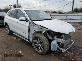2016 BMW X1 xDrive28i with VIN WBXHT3C36GP884211, listed as a Copart auction lot 41121133 with 62,282 mi miles. Bid and sale history available at carsss.com. Image 4.