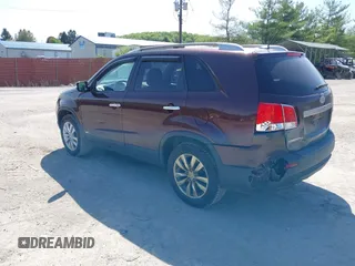 2012 Kia Sorento LX with VIN 5XYKTCA64CG279195, listed as a IAAI auction lot 42144679 with 116,690 mi miles. Bid and sale history available at carsss.com. Image 3.