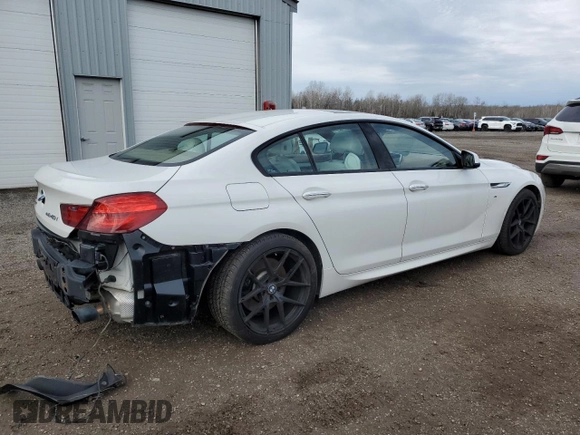 2015 BMW 6 Series 640i xDrive z VIN WBA6B8C56FD453175, wystawiony jako Copart lot #81372044 z przebiegiem 111 835 mil mil oraz Czysty tytuł • Clean title. Historia ofert i sprzedaży dostępna na DreamBid. Obrazek 3.