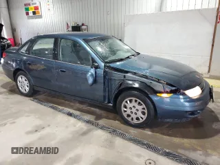 2002 Saturn LS z VIN 1G8JU54F22Y577454, wystawiony jako Copart lot #55771555 z przebiegiem 134 314 mil mil oraz Szkody całkowita. Historia ofert i sprzedaży dostępna na DreamBid. Obrazek 4.