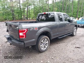 2018 Ford F-150 XL z VIN 1FTEX1EPXJFA67913, wystawiony jako IAAI lot #42264824 z przebiegiem 60 058 mil mil oraz . Historia ofert i sprzedaży dostępna na DreamBid. Obrazek 4.